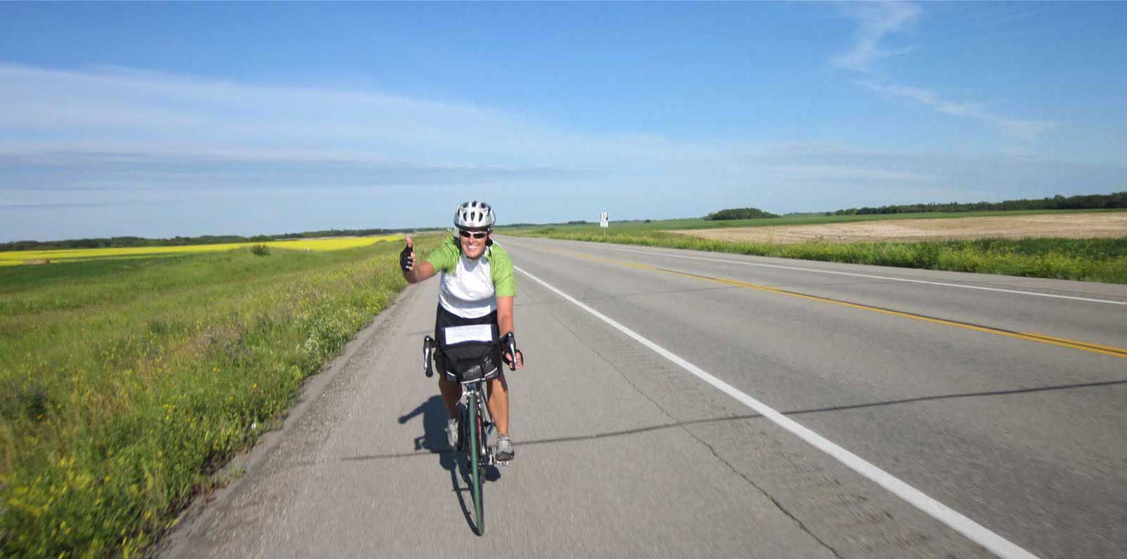 Tour du Canada cyclist on the prairies
